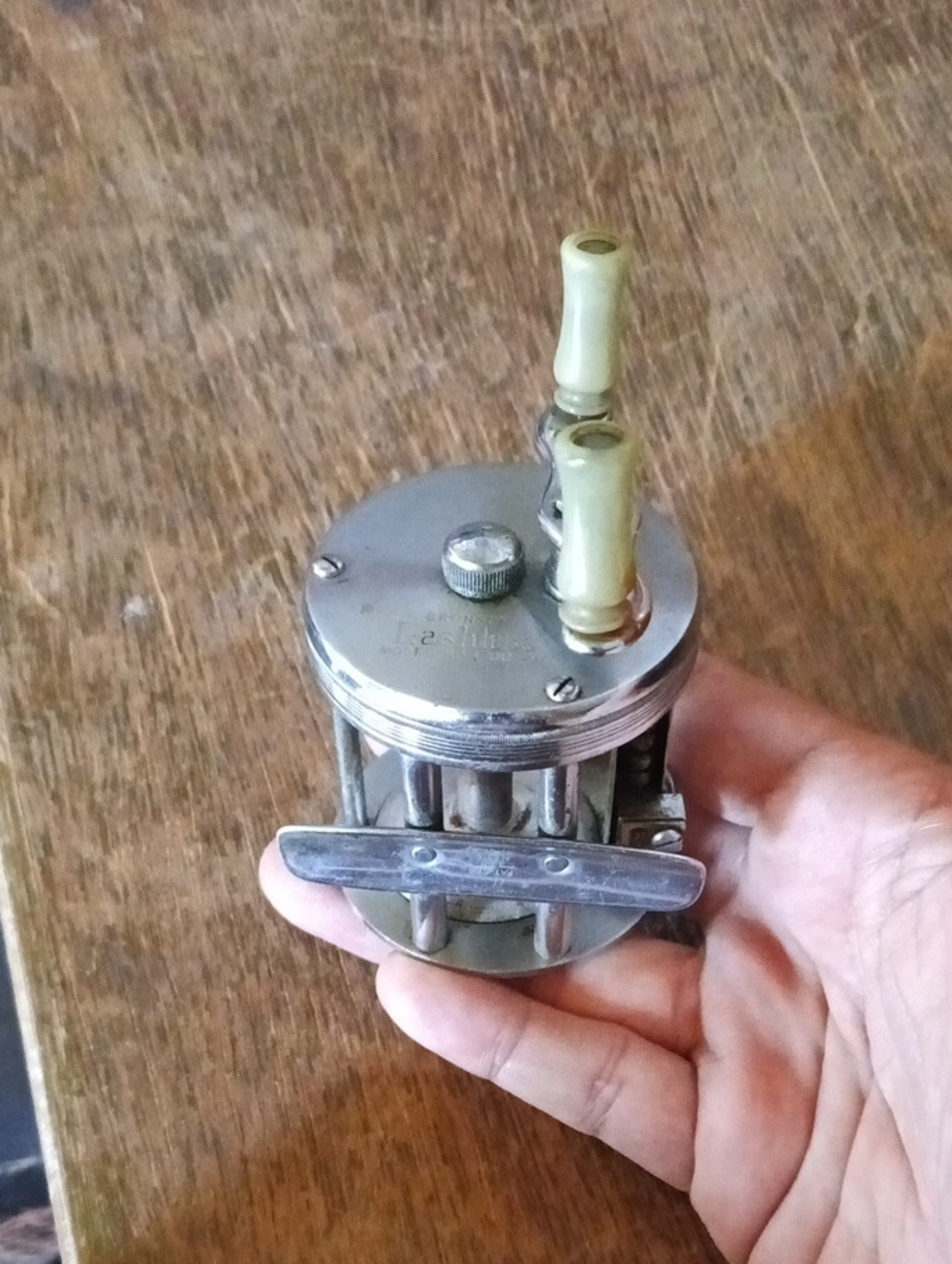 Bronson Lashless Model 1700-A Fishing Reel with Ivory Handles